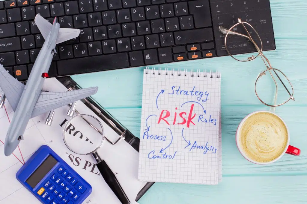 What is Travel Risk Management? 12 office desk with stuff and note about risk 2024 09 17 09 53 26 utc 1024x683 1
